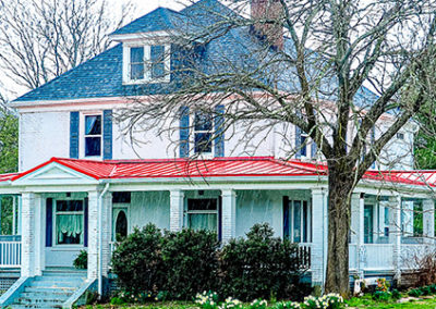 Roanoke, VA home with red and black shingles