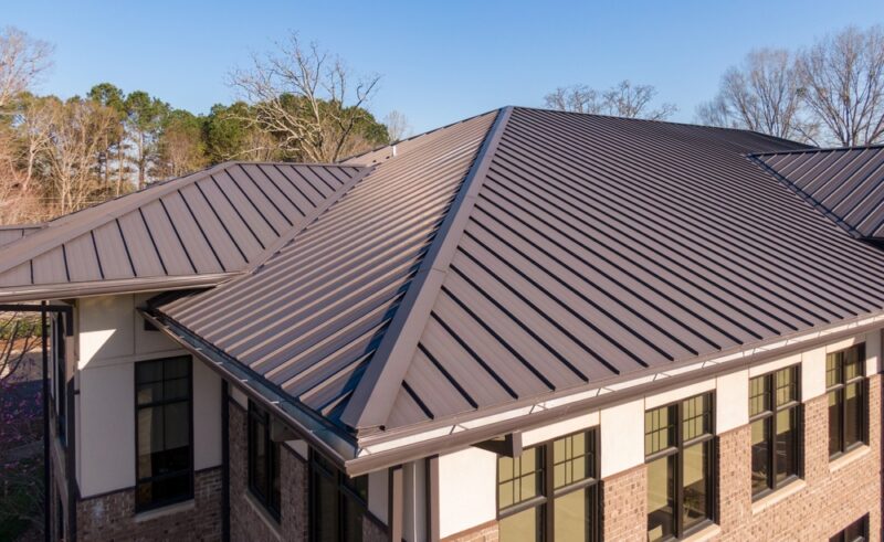 Choosing Your Metal Roofing: R-Panel vs. Standing Seam